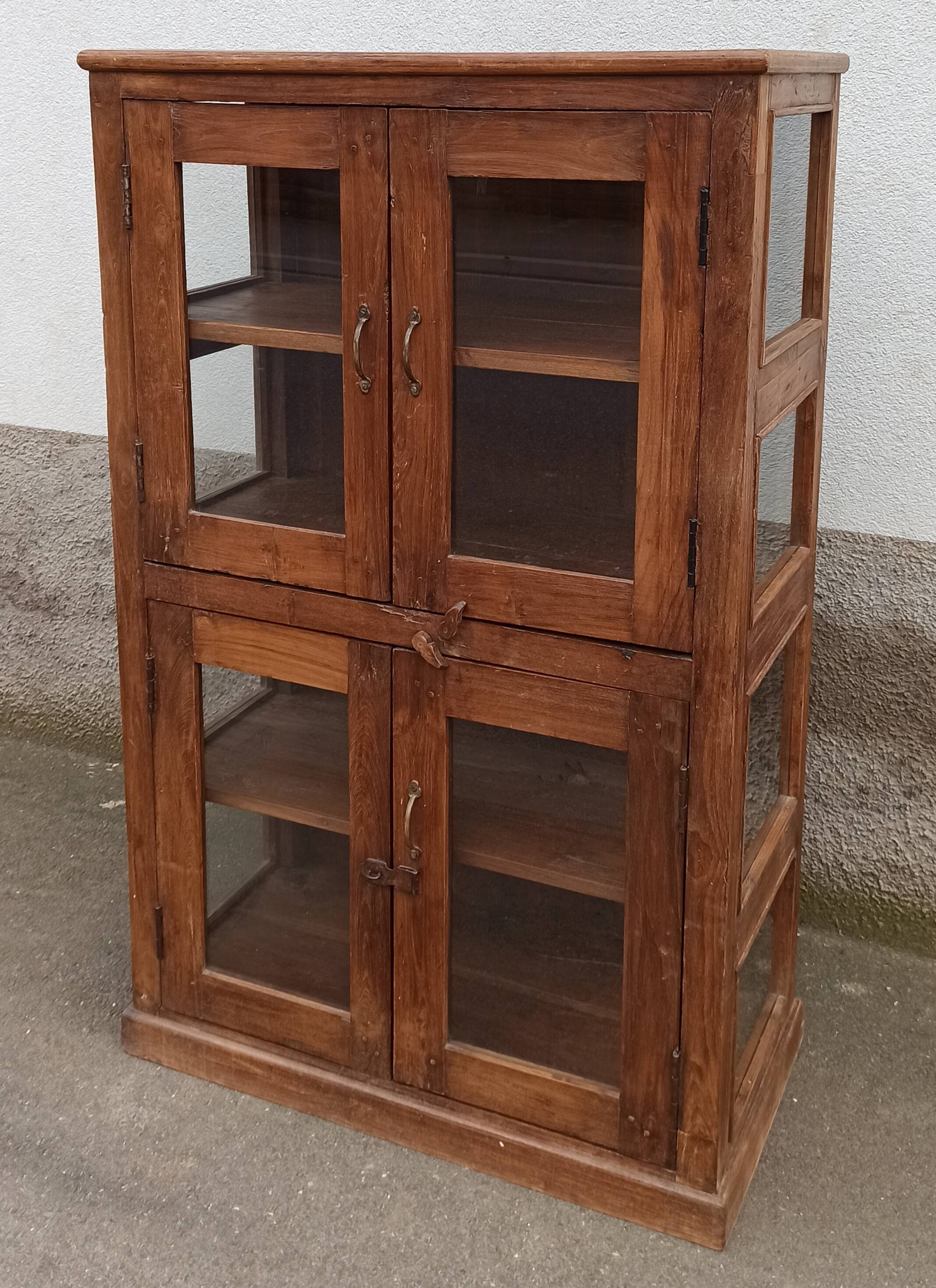 Old wooden display cabinet with three glazed sides