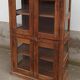 Old wooden display cabinet with three glazed sides