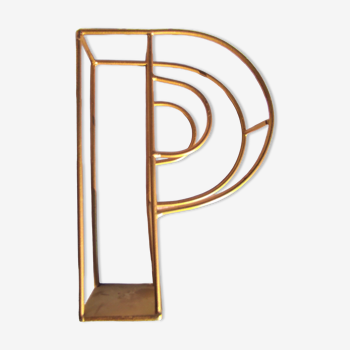 Letter p in gilded metal or d in the other direction