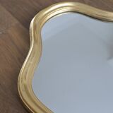 Golden mirror in wood and gold leaf