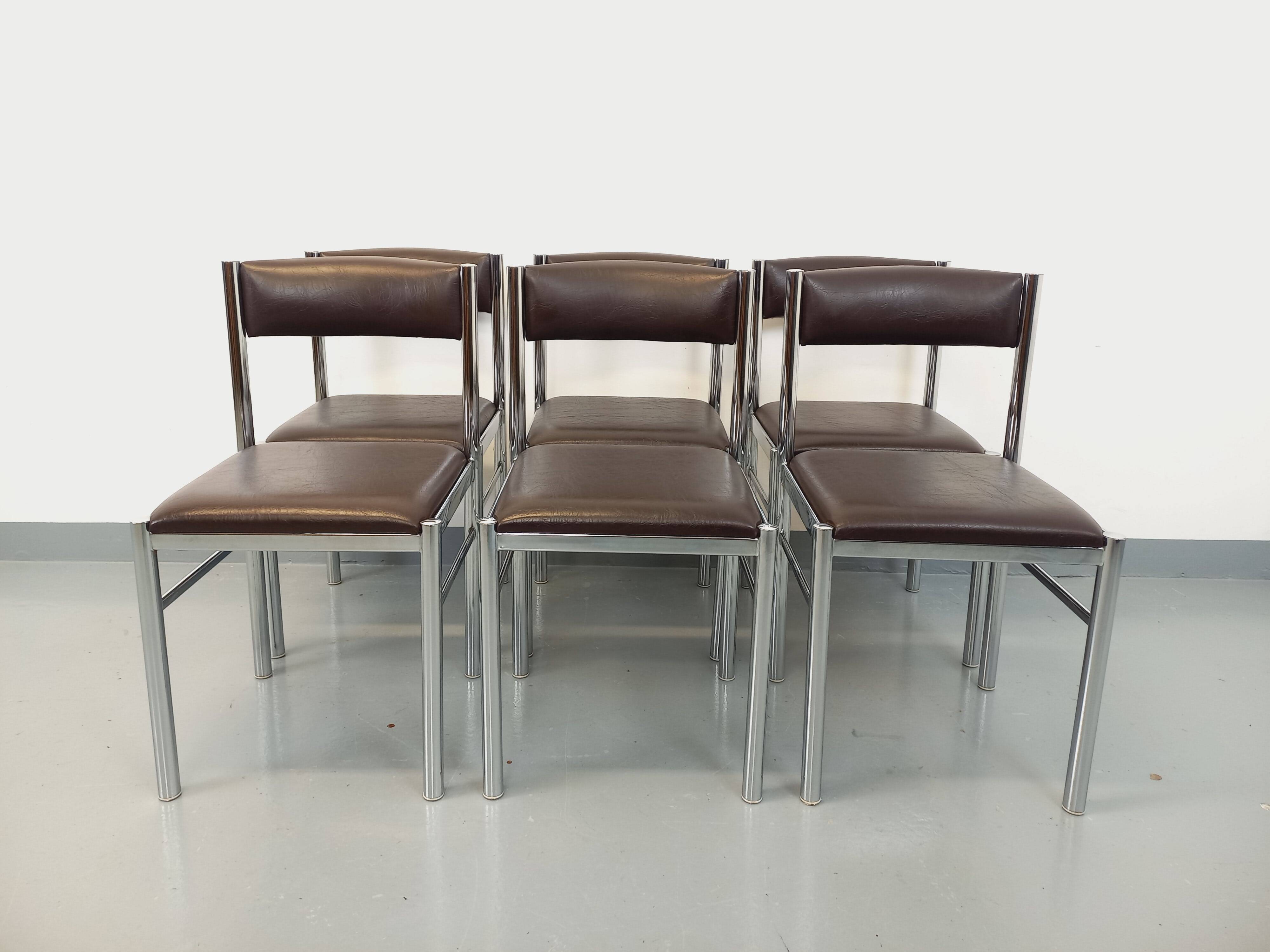 Set of 6 vintage chairs from the 70s in chrome metal and brown faux leather.