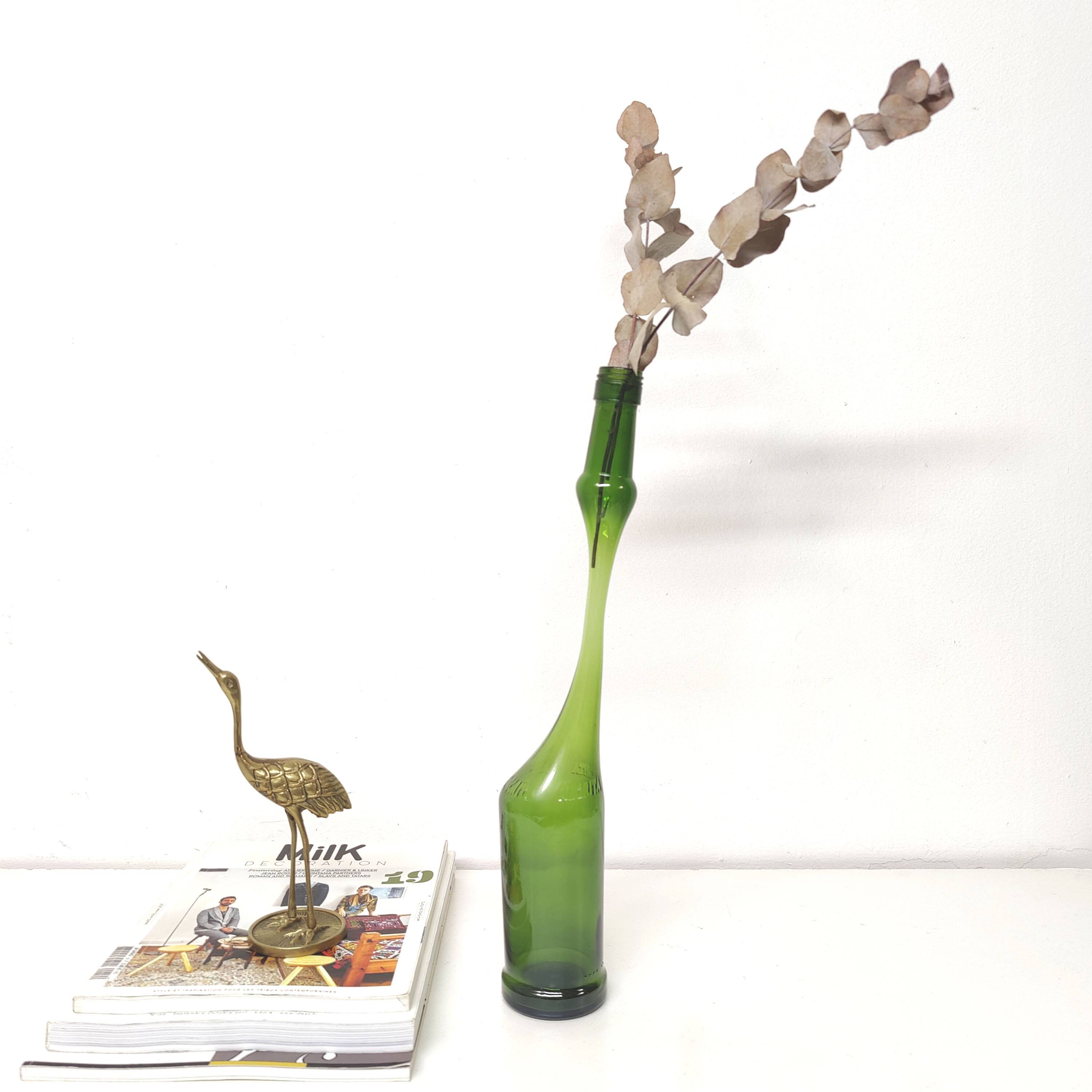 Green Negrita rum bottle atypical distorted decanter vase