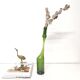 Green Negrita rum bottle atypical distorted decanter vase