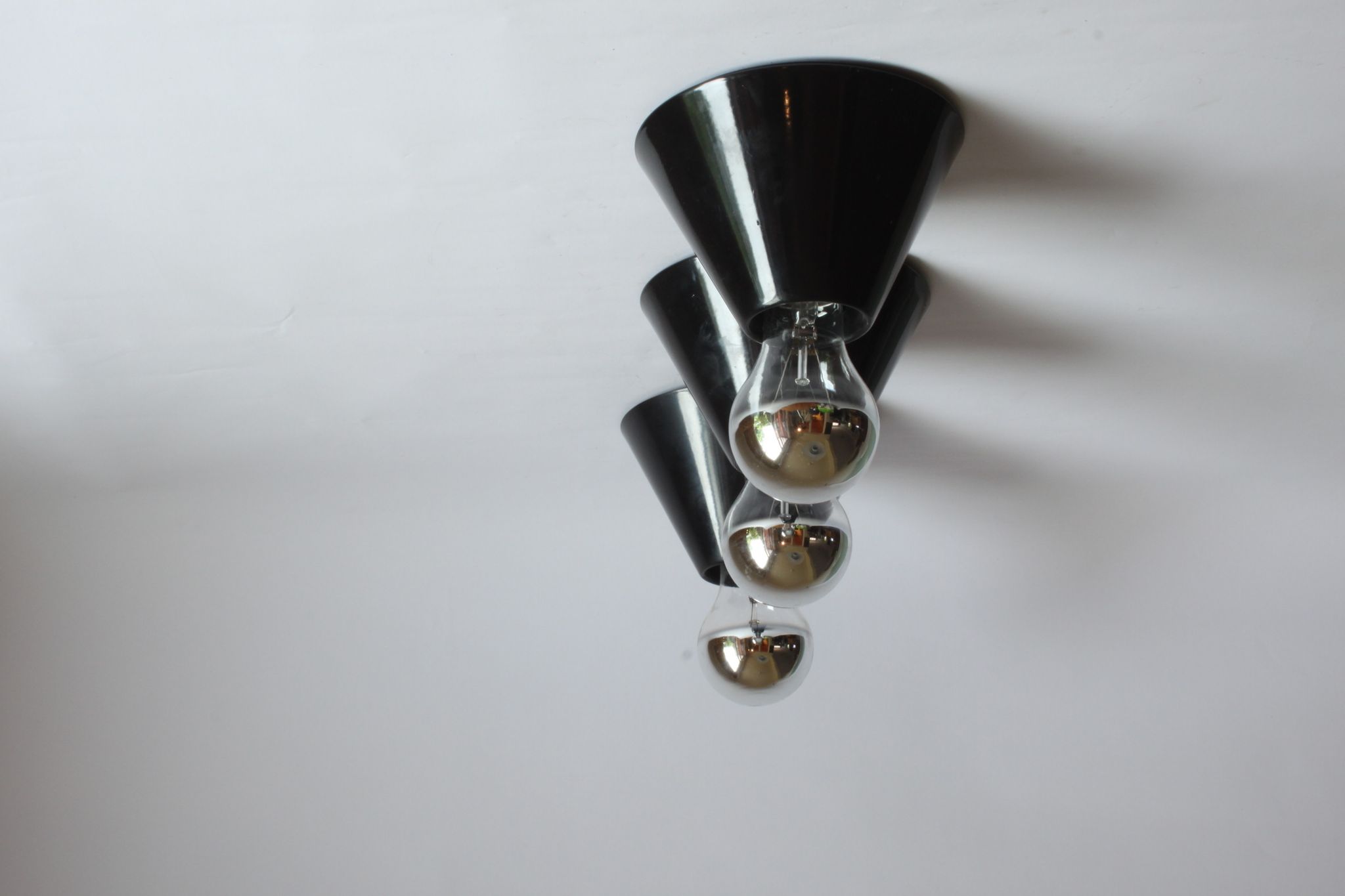 Black cone ceiling lights "Jolly" by Bruno Celupica for Tronconi, Italy 1970s, set of three.