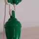 Industrial hanging in green metal with pulley
