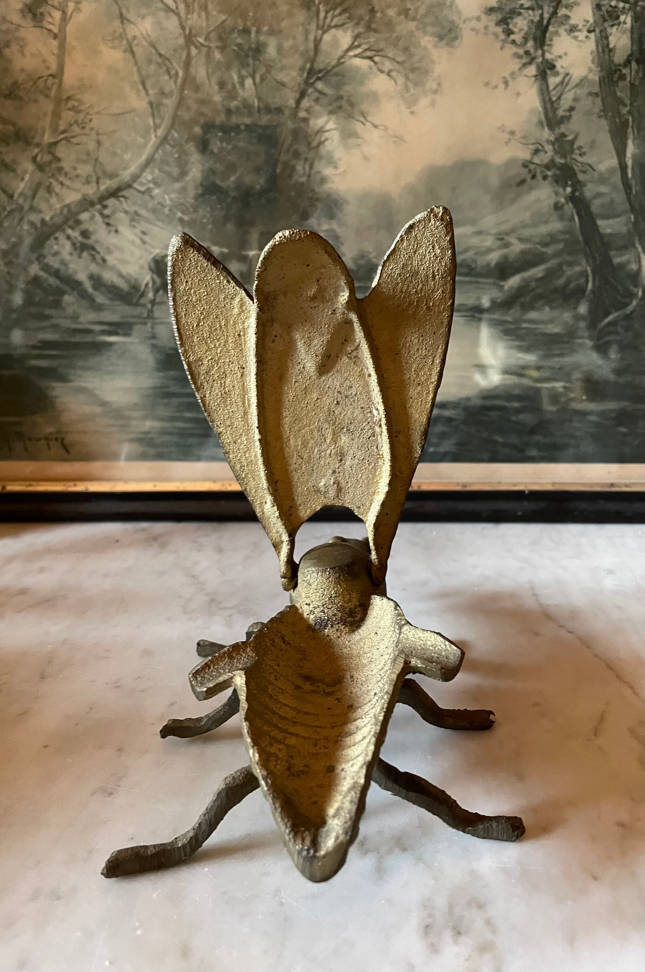 Golden metal insect ashtray