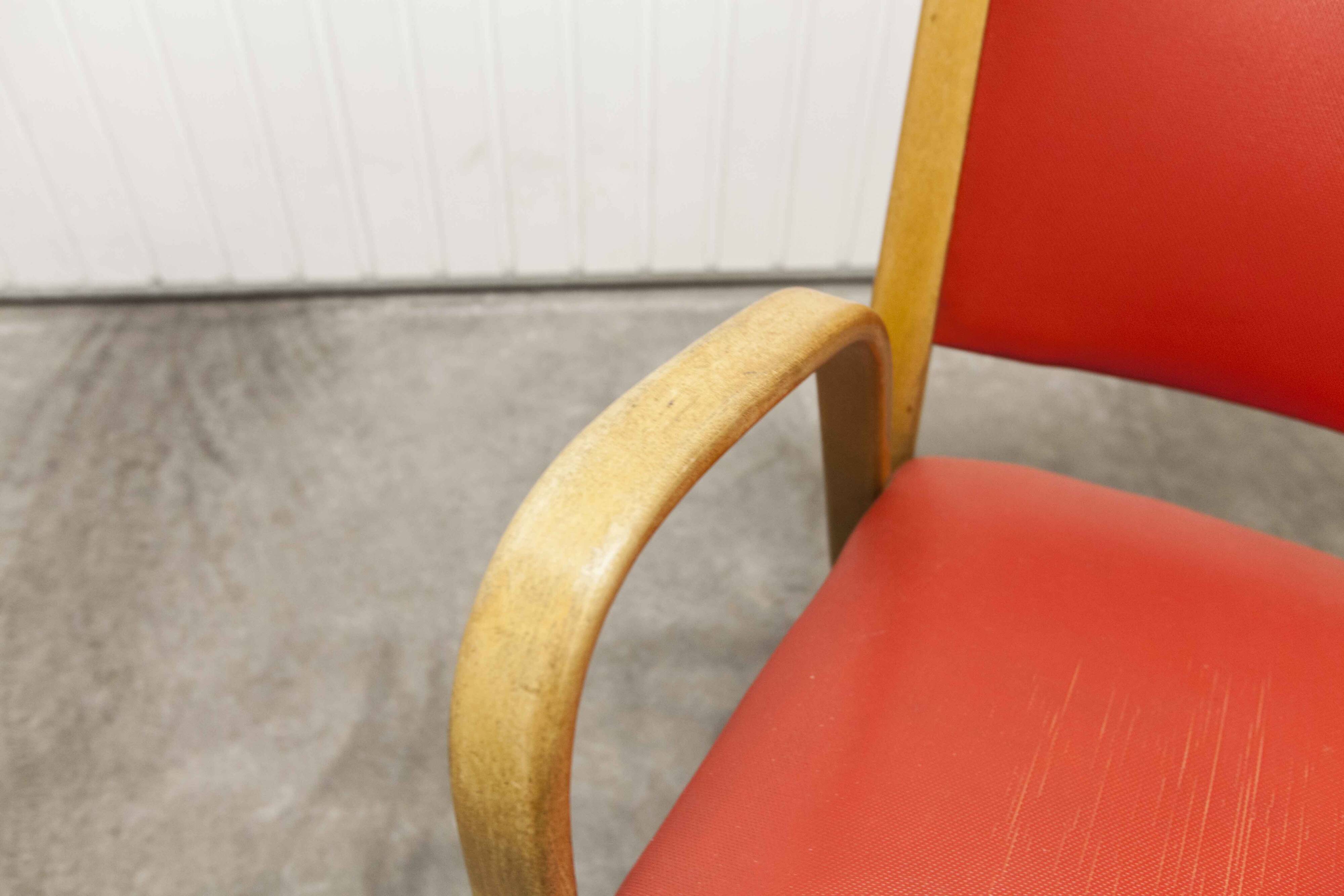 Bow wood armchair by Hugues Steiner 1960 red