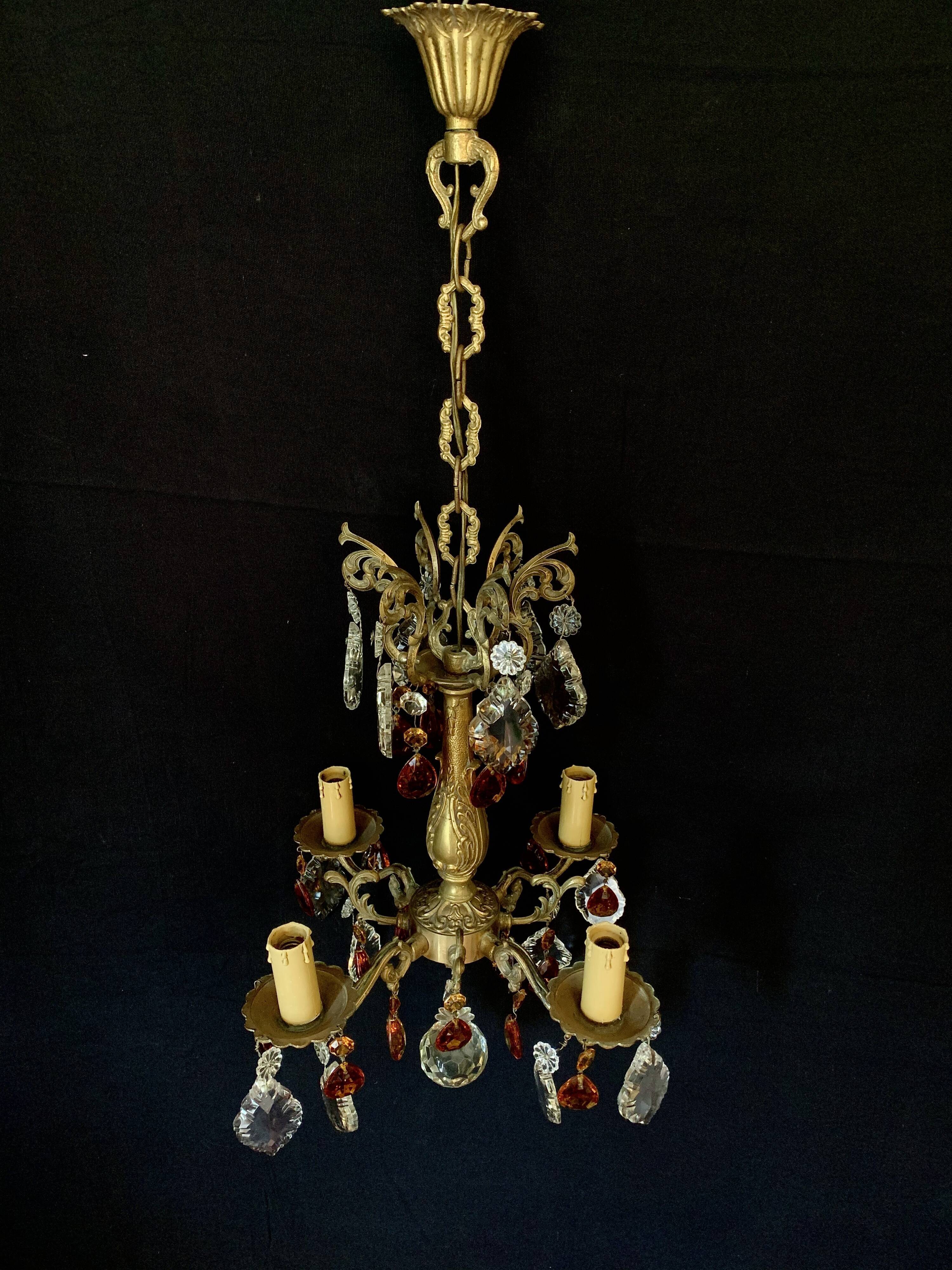 4 bronze lights and tassels chandelier