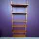 Modular shelving unit “Royal System” by Poul Cadovius, dating from the 1950s.