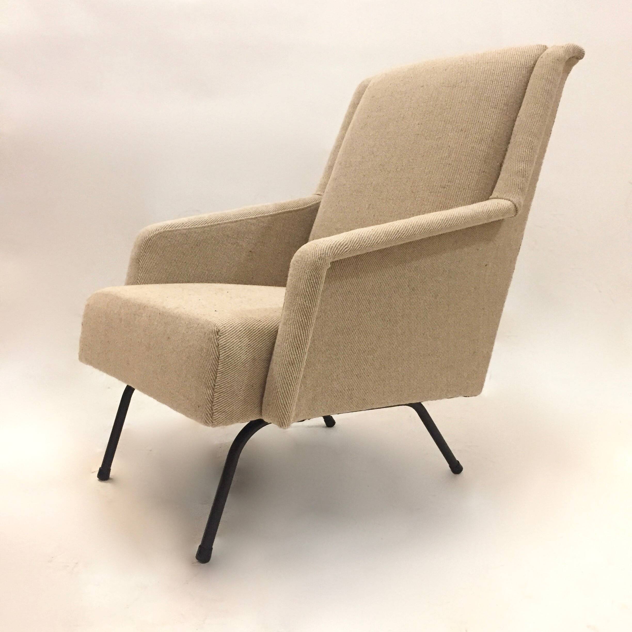 reupholstered modernist armchair