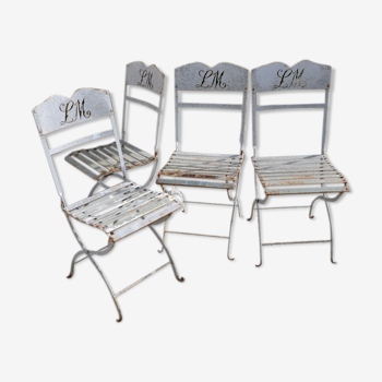L M monogrammed metal garden chairs