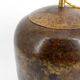 Art Deco modernist lamp in patinated brass, circa 1930.