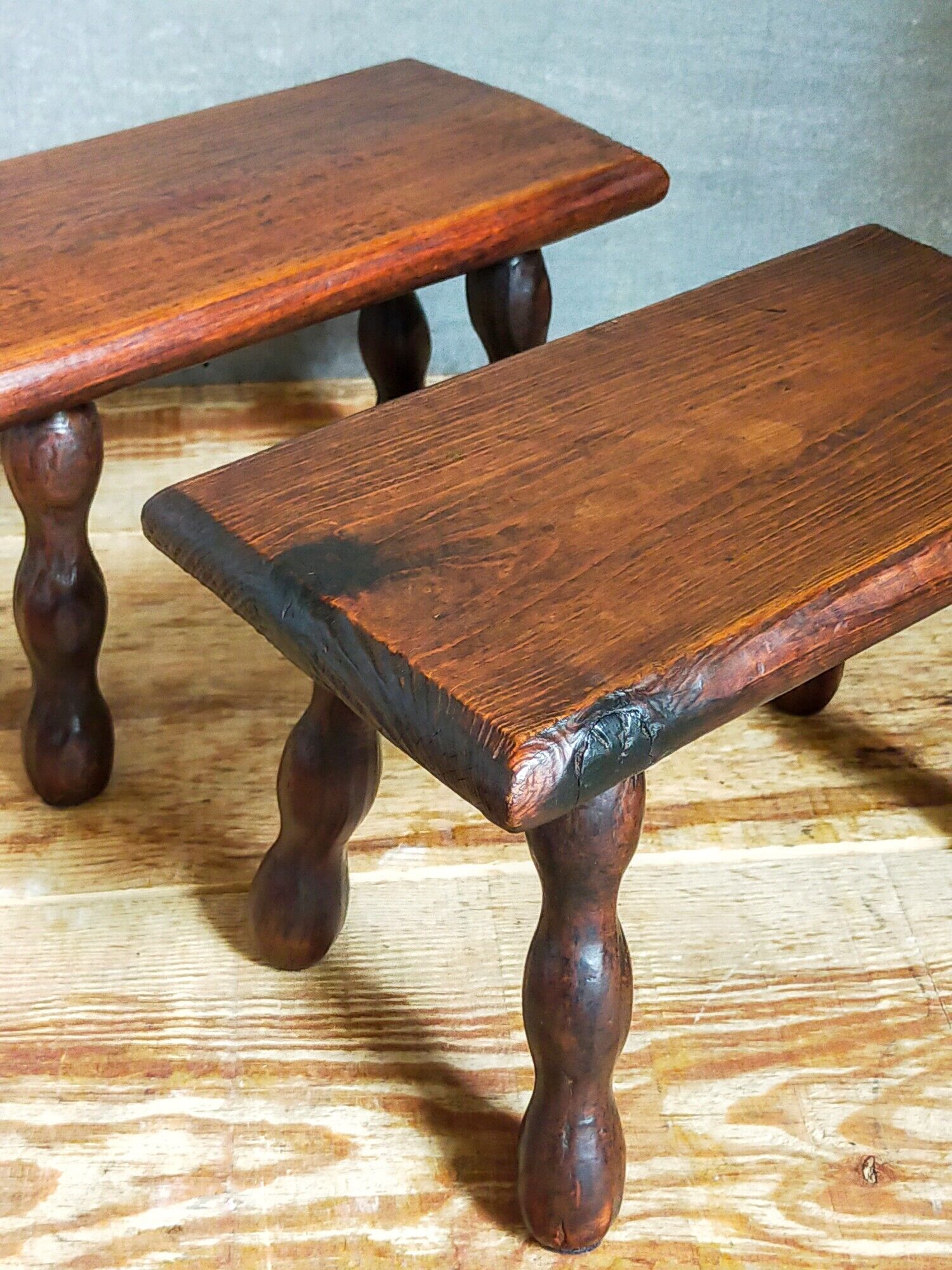 Pair of vintage solid turned wood footstools