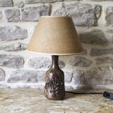 Sandstone lamp base decorated with flowers