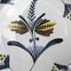 Flat Plate or Small Round Porcelain Dish Signed Nelly Abstract Flower