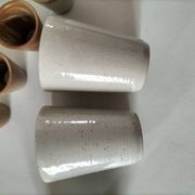 Set of 8 stoneware cups and a mug, shades of beige.