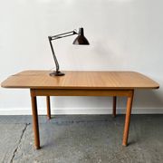 Mid-Century modern extending dining table by Schreiber Furniture