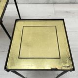 Suite of metal and glass nesting tables.