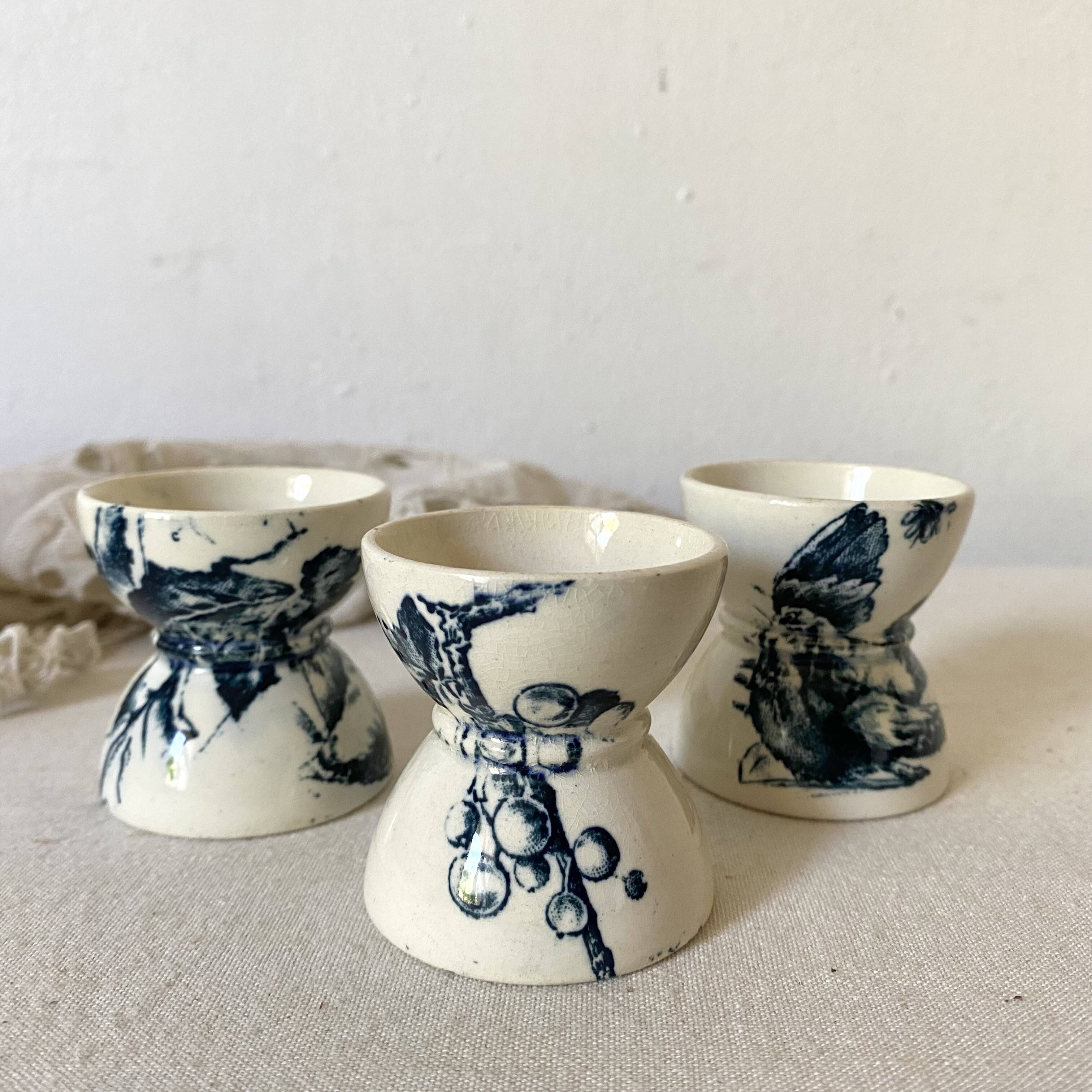 Old diabolo iron earth egg cups