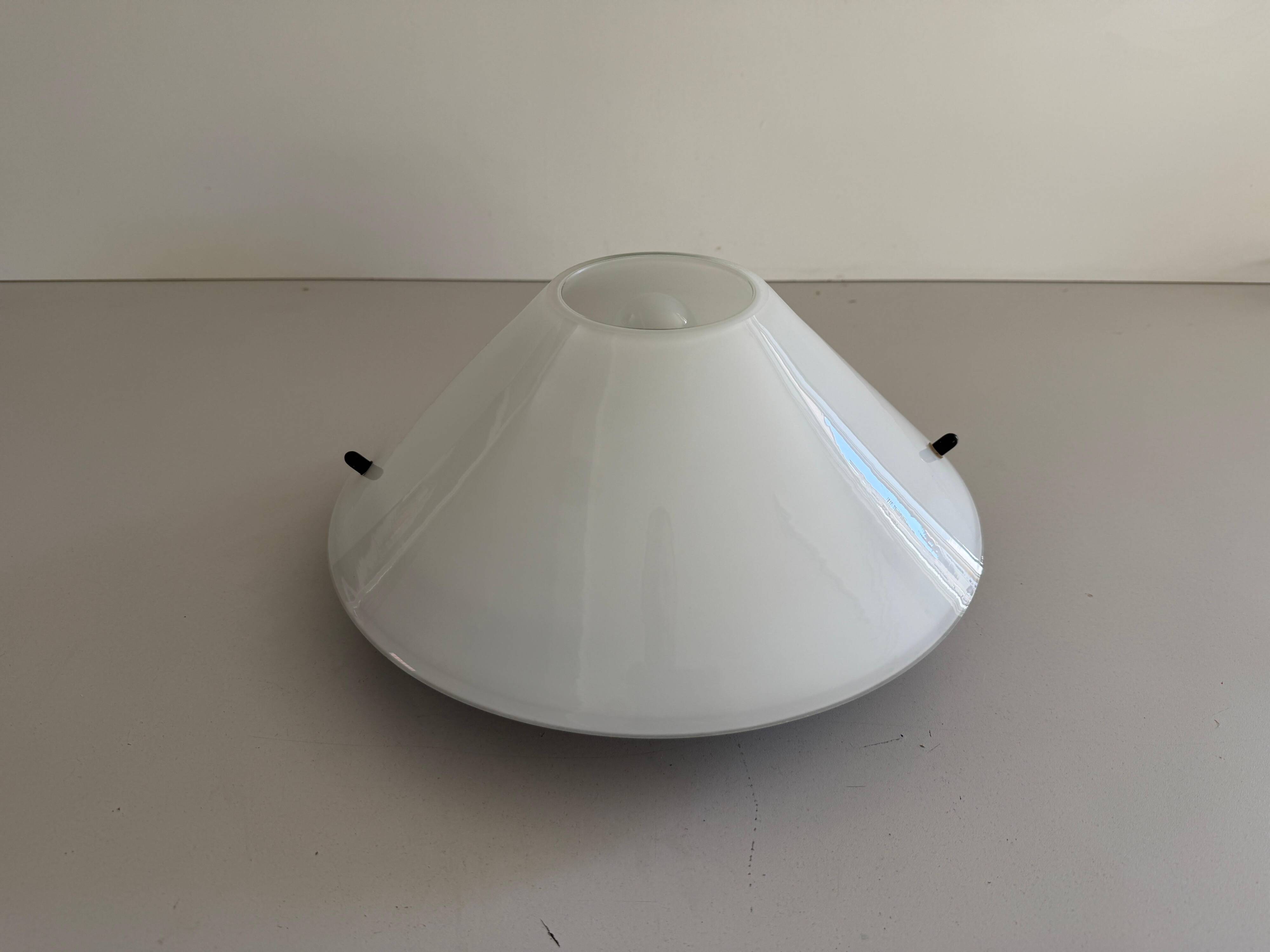 Simple opal glass wall light from the mid-century by Lamperti, 1960s, Italy.