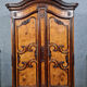 Bressane wardrobe Louis XV era with gendarme's hat in walnut and elm around 1750