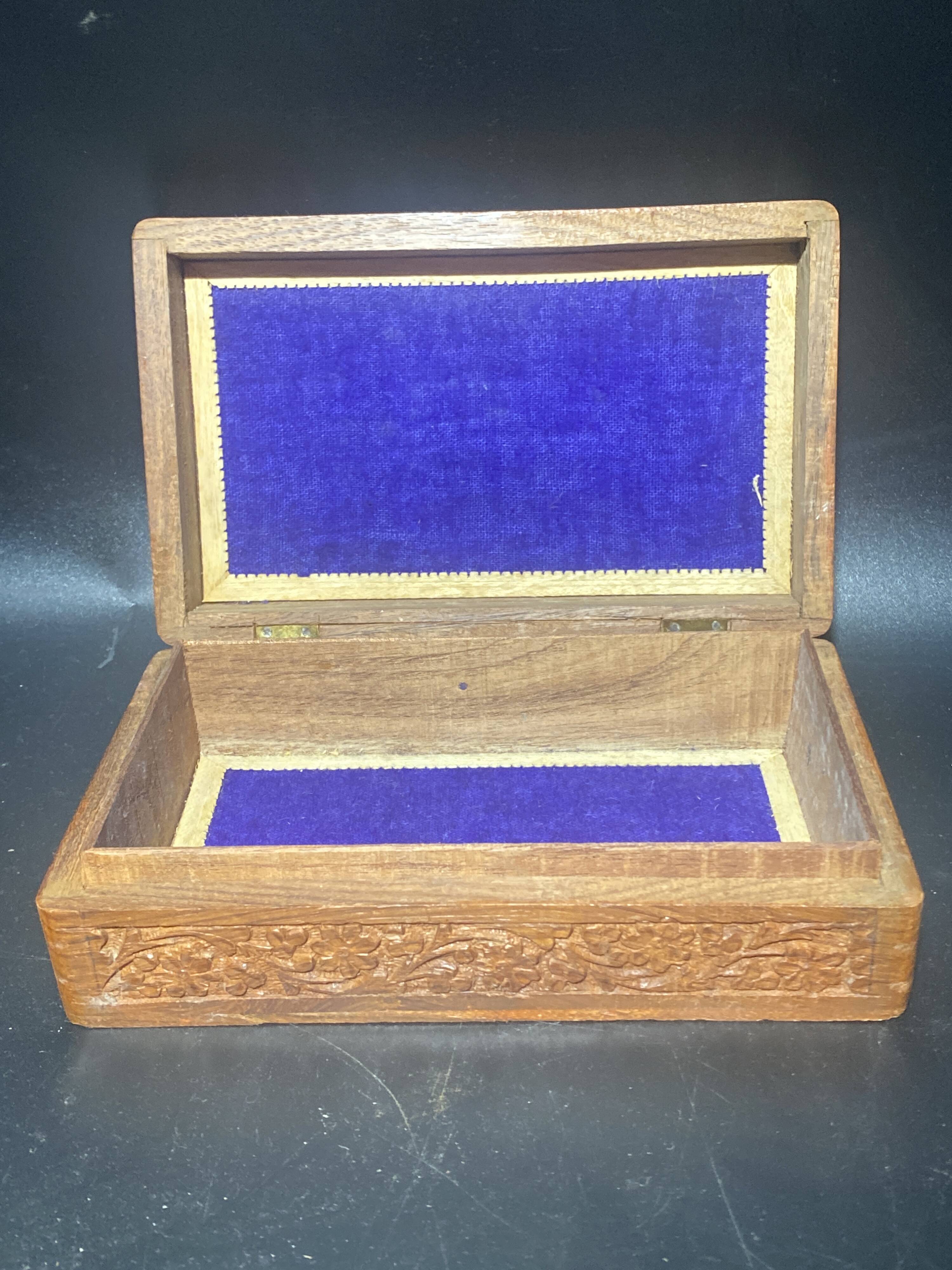 Carved wooden box