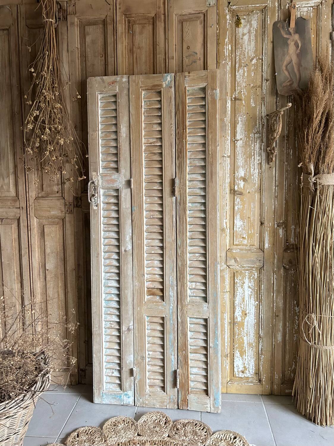 Trio of antique castle shutters