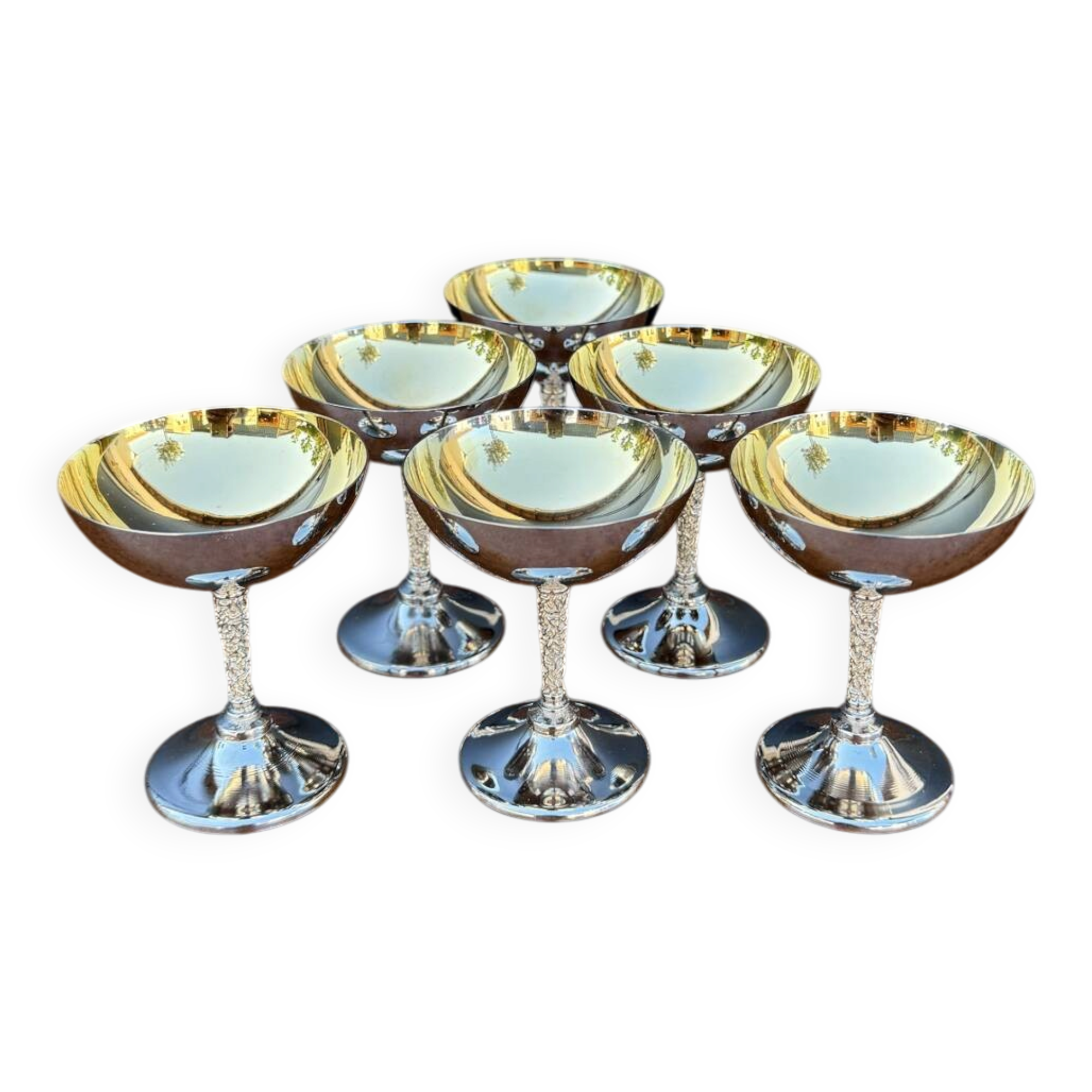 Silver-plated metal wine glasses on stems from the 1970s.