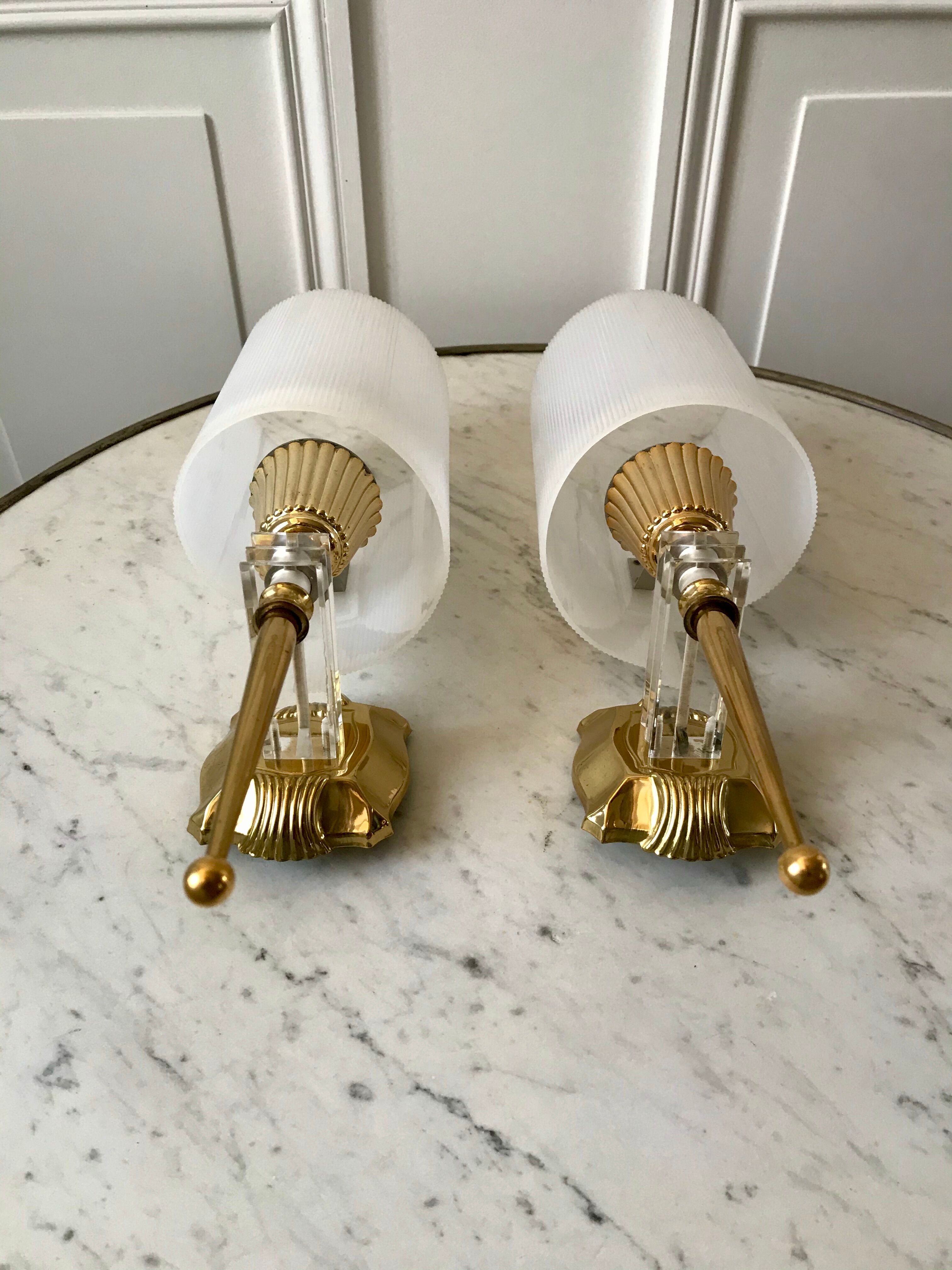 Pair of gold steel wall lamps, plexi and pleated plastic shades 60s-70s