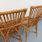 Set of 4 vintage Audoux Minet rattan chairs from the 1950s and 60s.