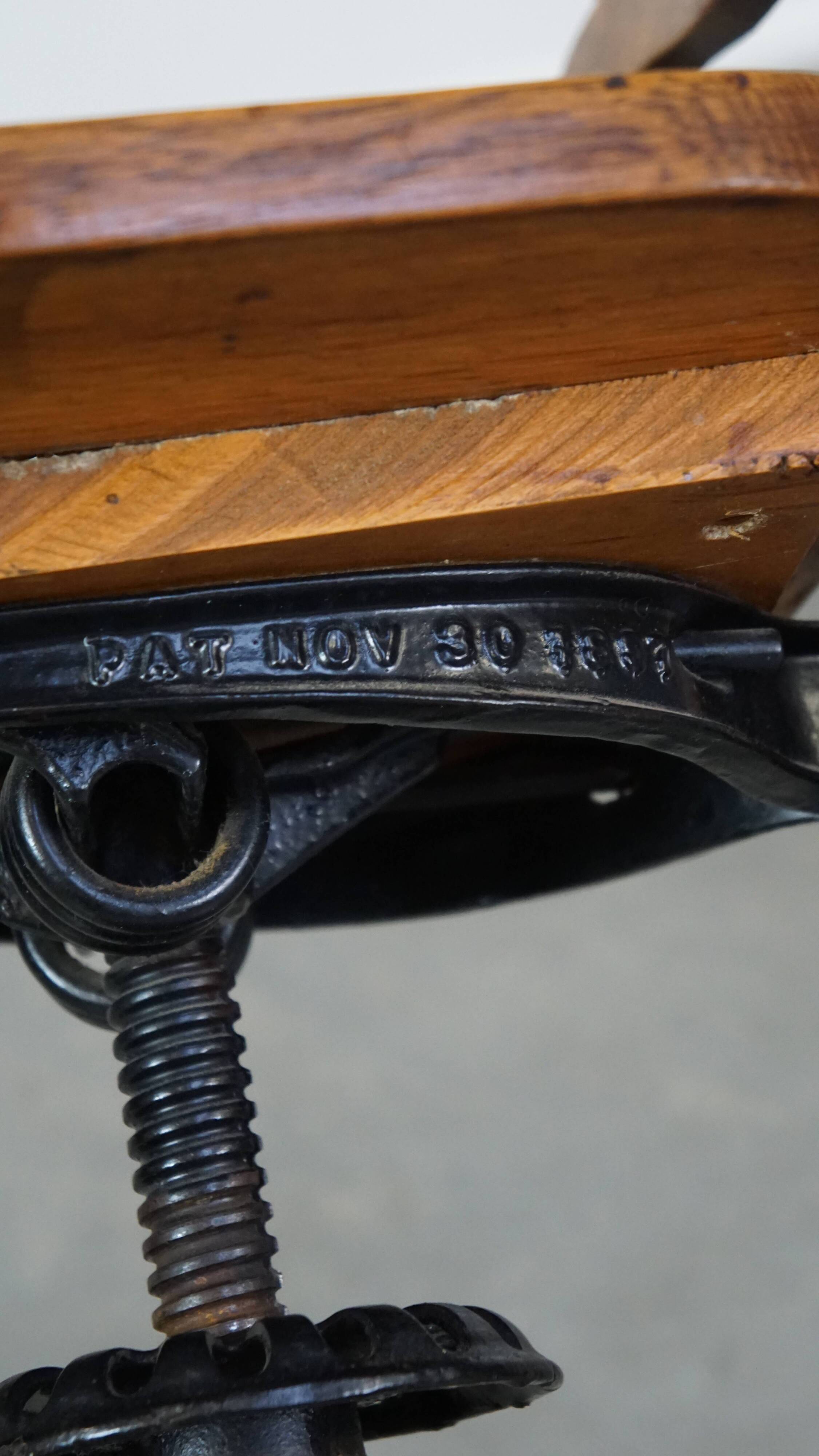 Antique late 19th century English office chair with reclining backrest and height adjustable