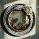 Round wall mirror in blue stoneware La Borne Catido floral decoration 1960 - Accidents