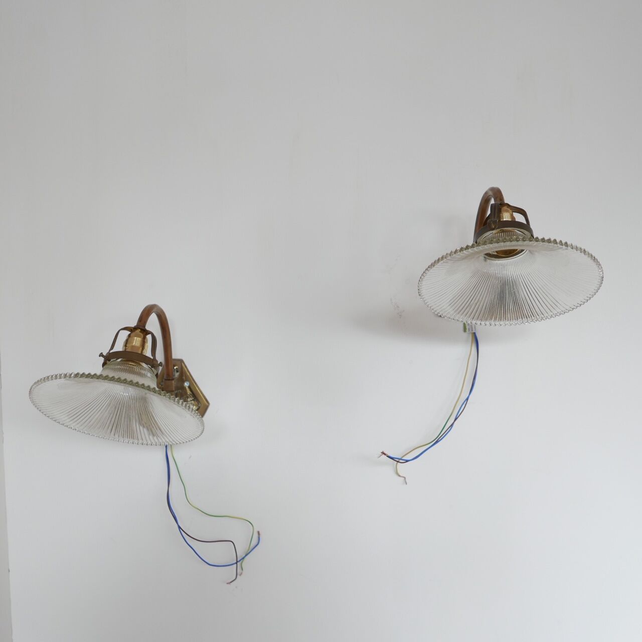 Pair of brass and glass wall sconces