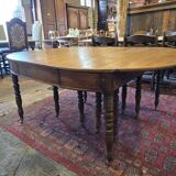 12-foot round oak table with 7 extensions / 20 people