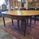 12-foot round oak table with 7 extensions / 20 people
