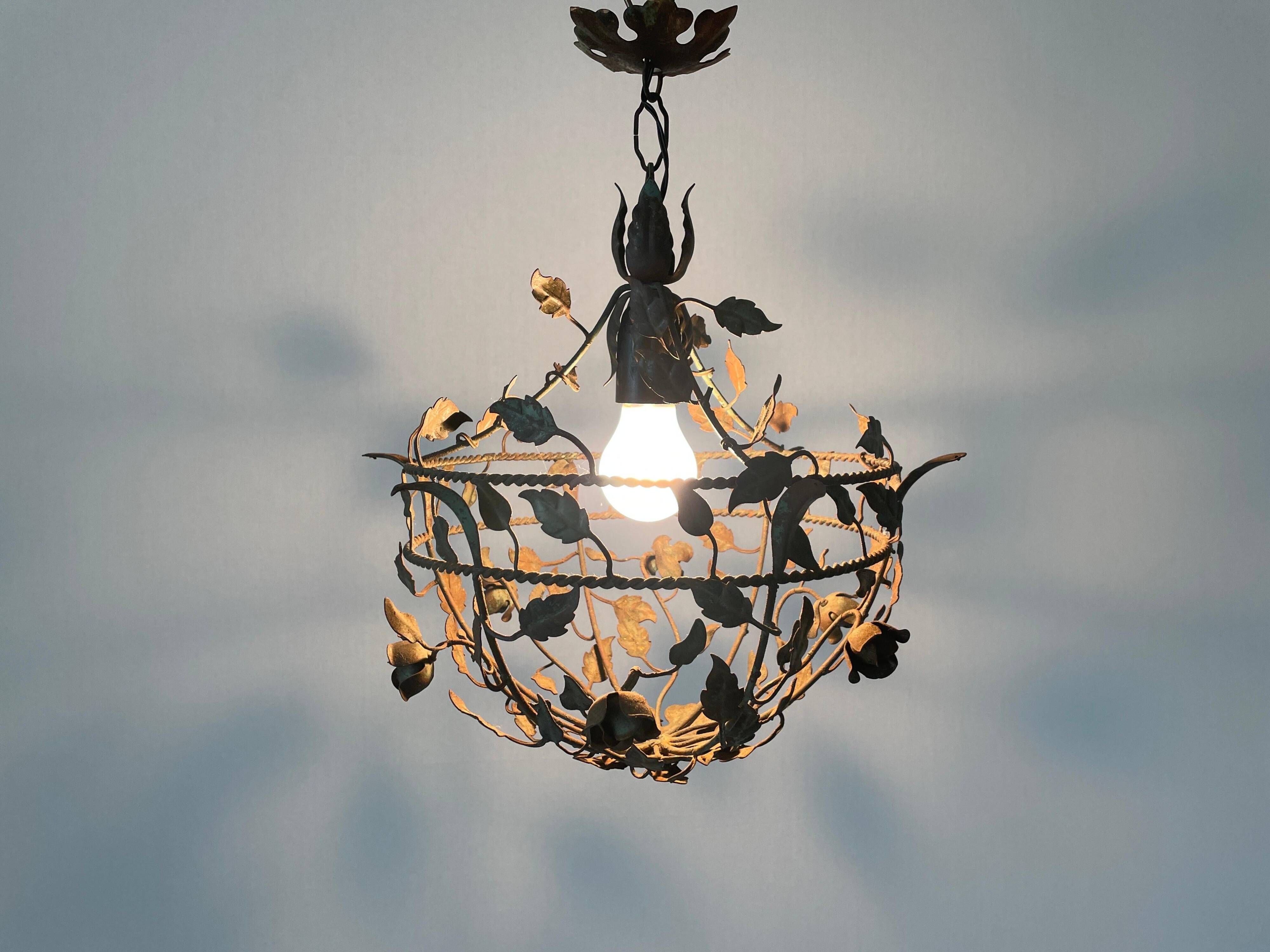 Patinated metal ceiling light with a floral and leaf pattern, 1950s, Italy.