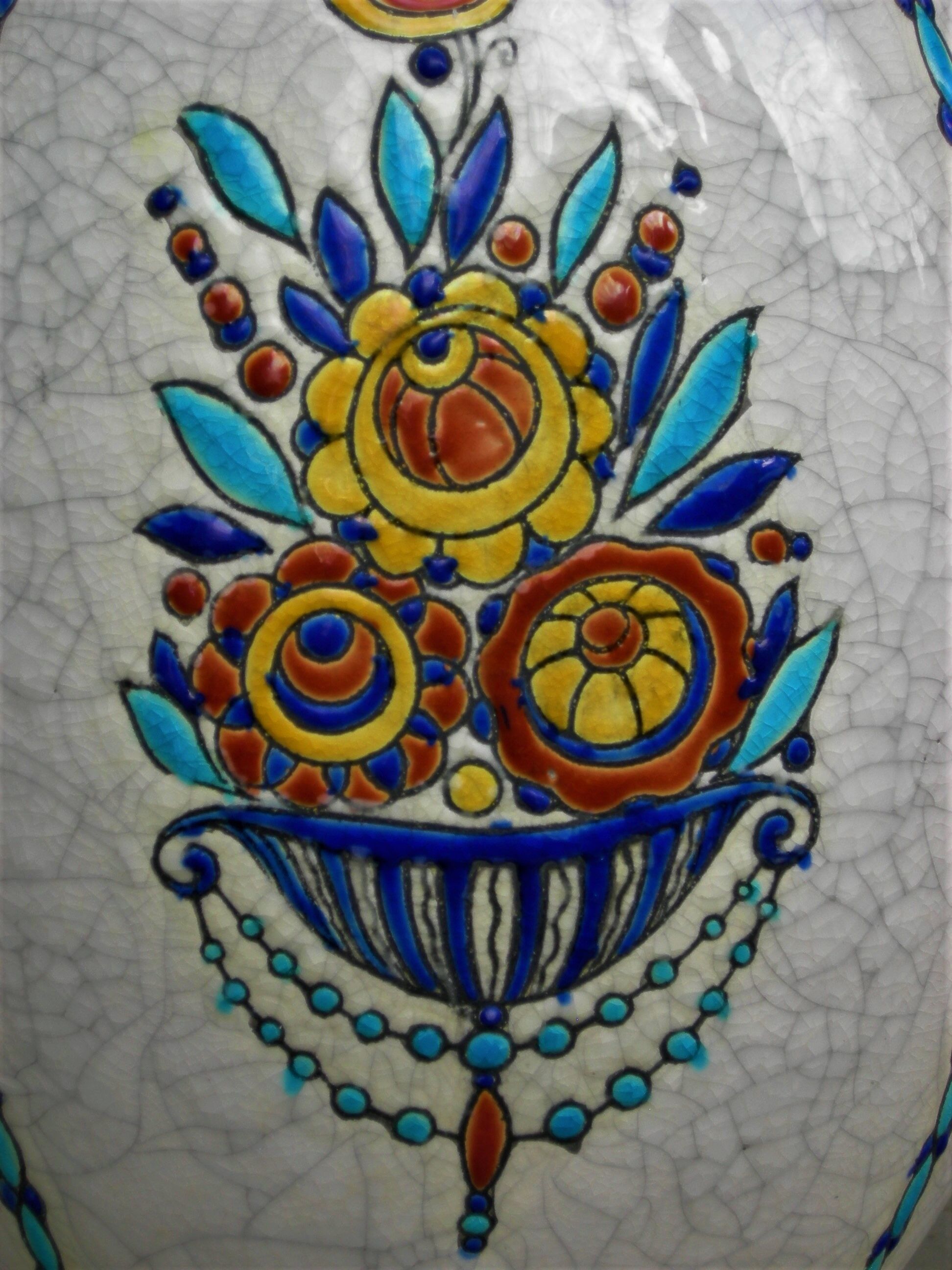 Boch La Louvière vase with a floral decoration in cracked faience