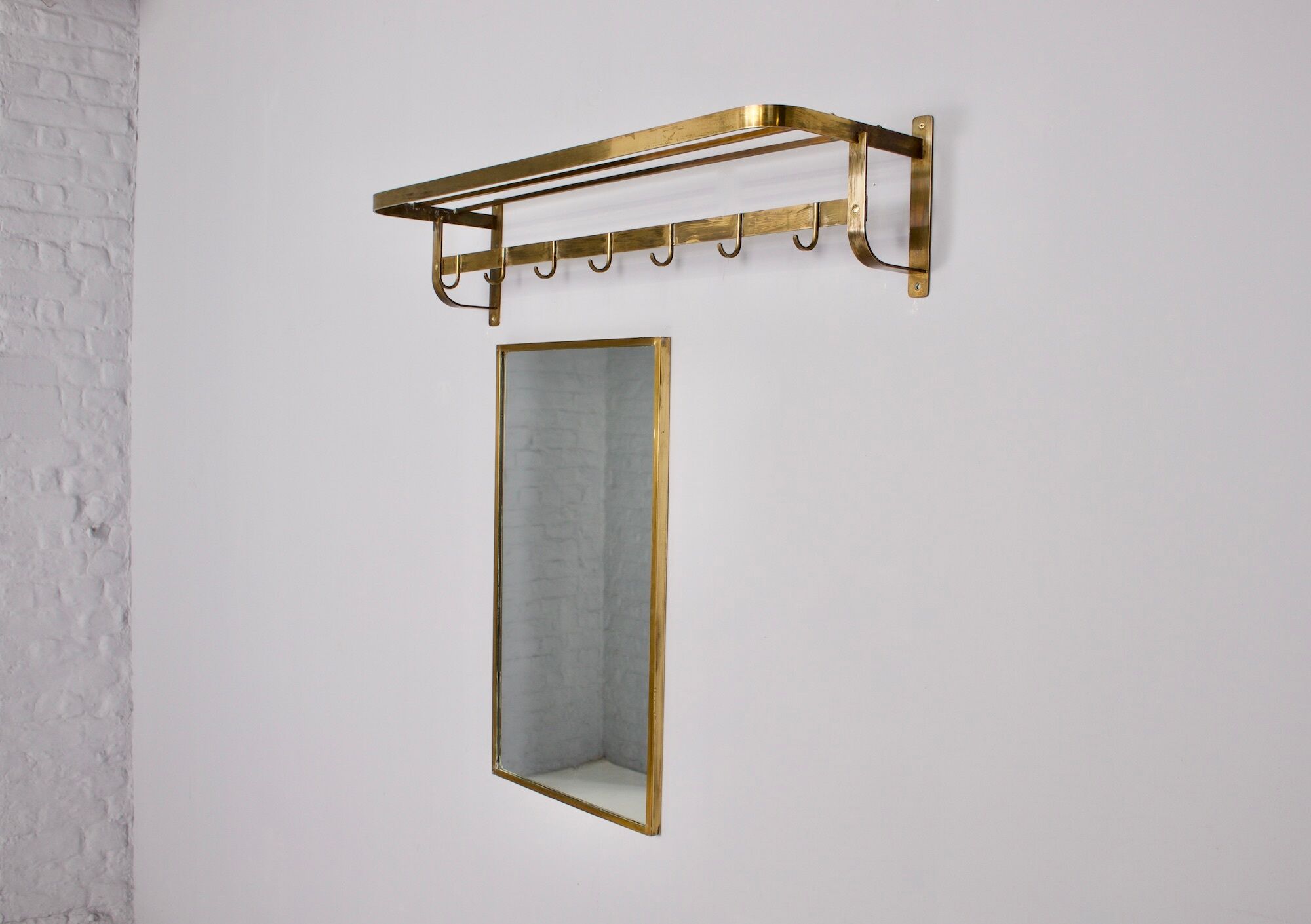 Vereinigte Werkstätten, brass cloakroom and mirror