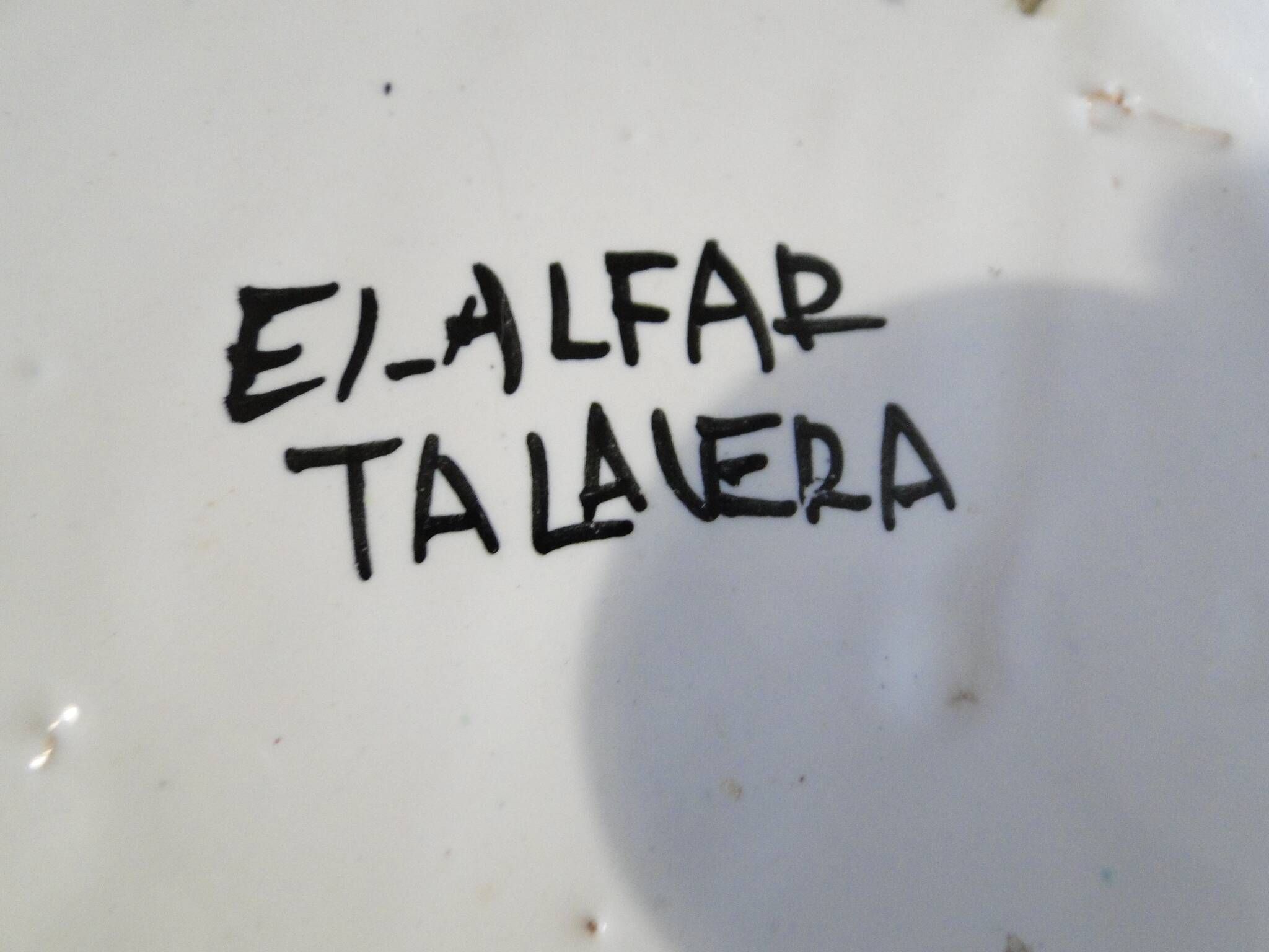 Decorative earthenware plate with floral Talavera decoration