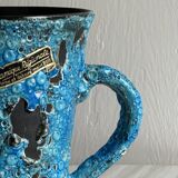 Pichet en céramique bleue émaillée