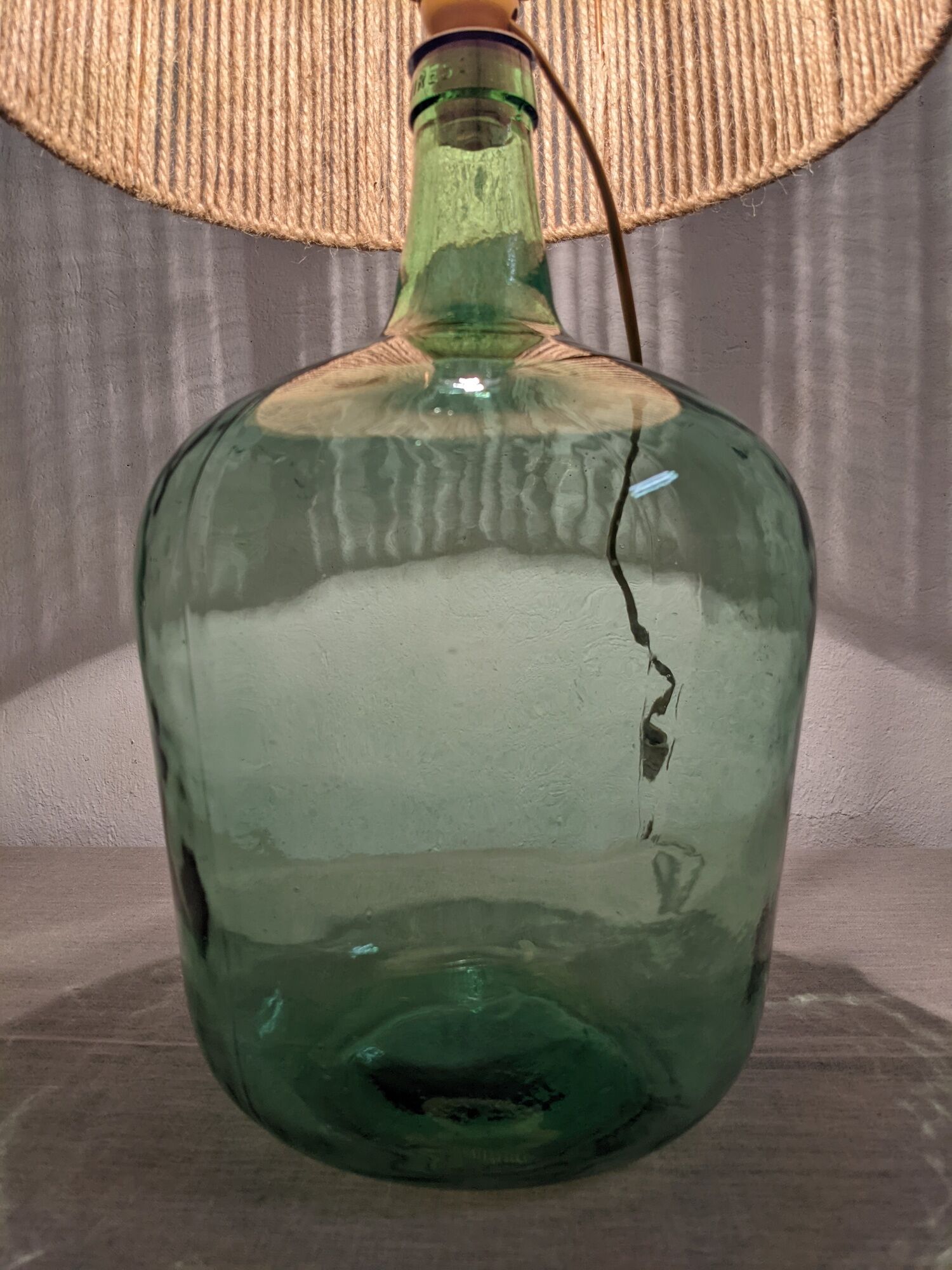 Vintage demijohn lamp in glass and XXL jute rope