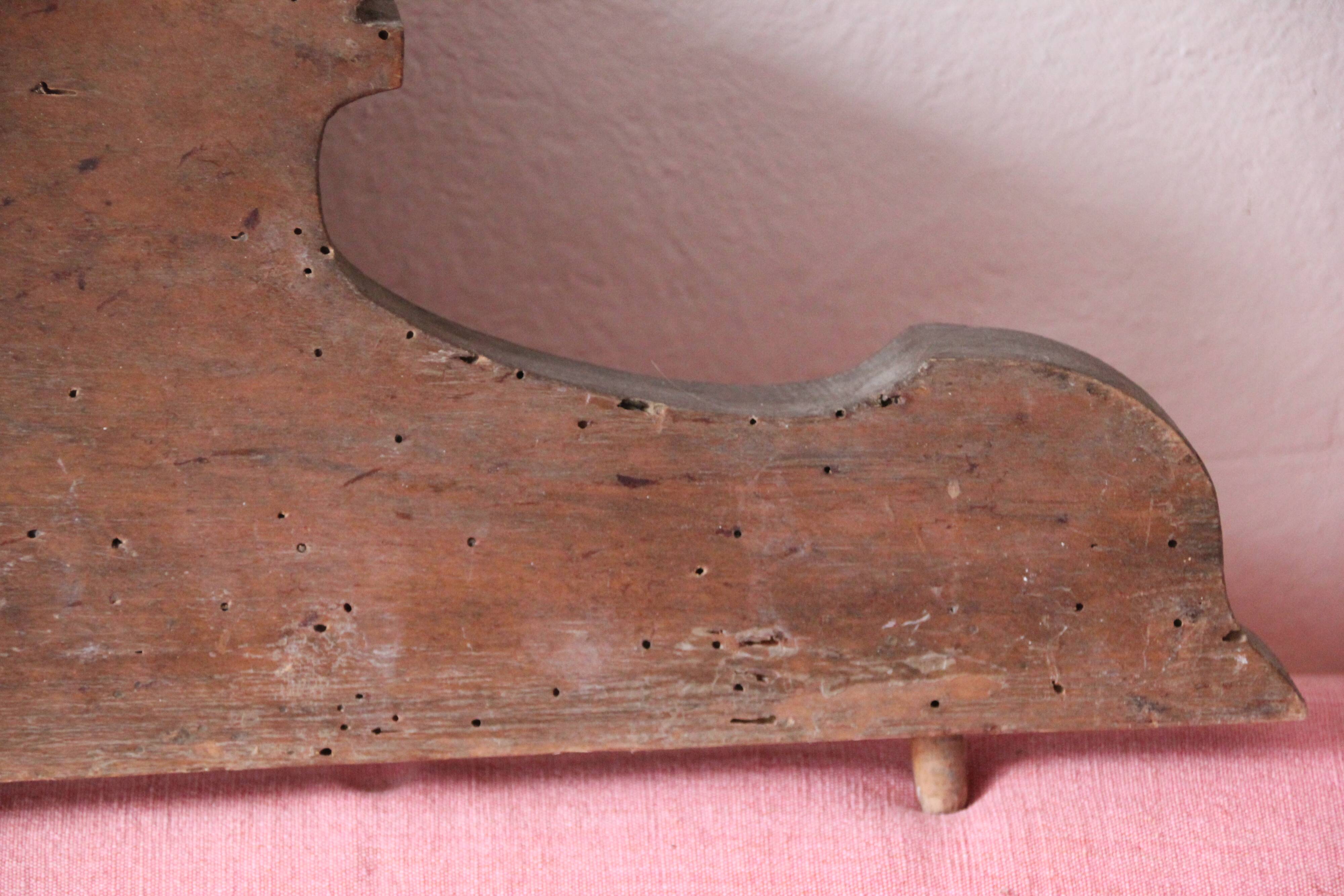Old pediment in solid and marquetry wood