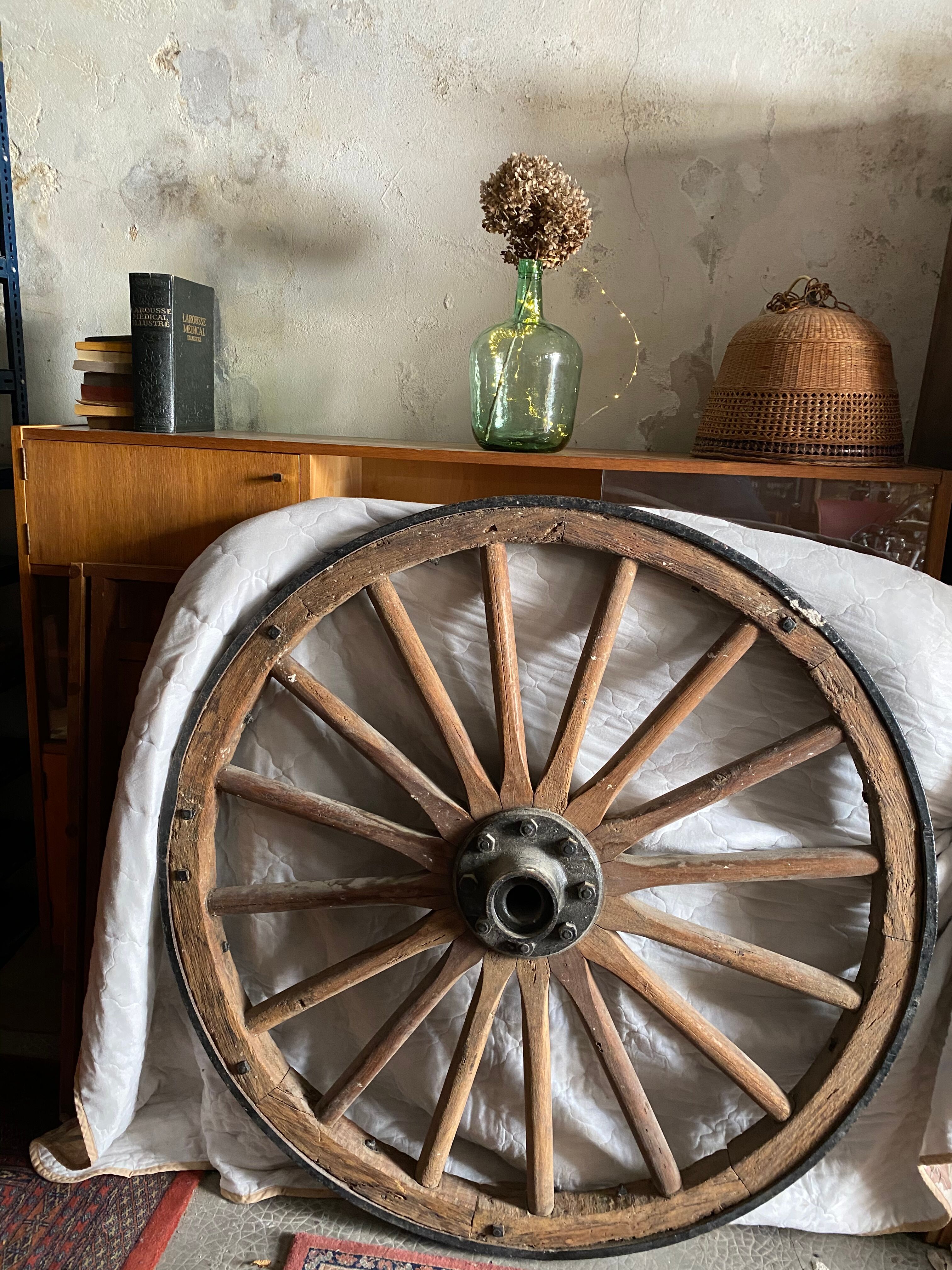 Wheel of wooden and cast iron cart