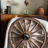 Wheel of wooden and cast iron cart