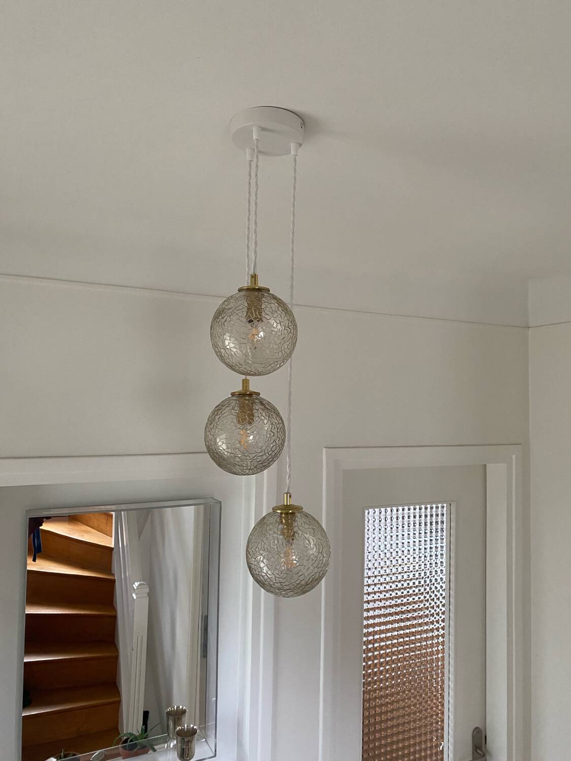 Triple pendant light with vintage glass globes