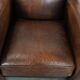 Beautifully shaped vintage sheepskin armchair with character