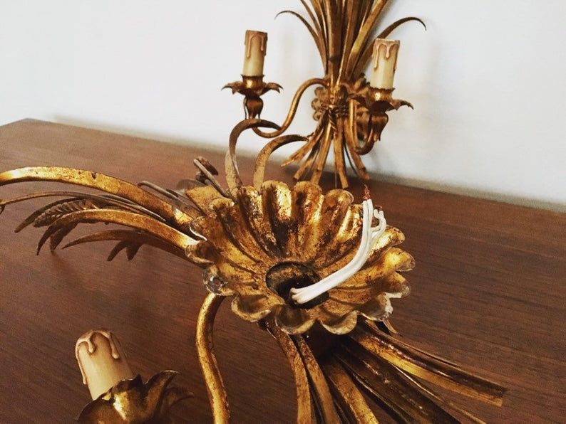 Pair of Italian Hollywood Regency metal wall lamps by Hans Kogl