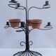 Vintage seven-light terracotta metal candlestick