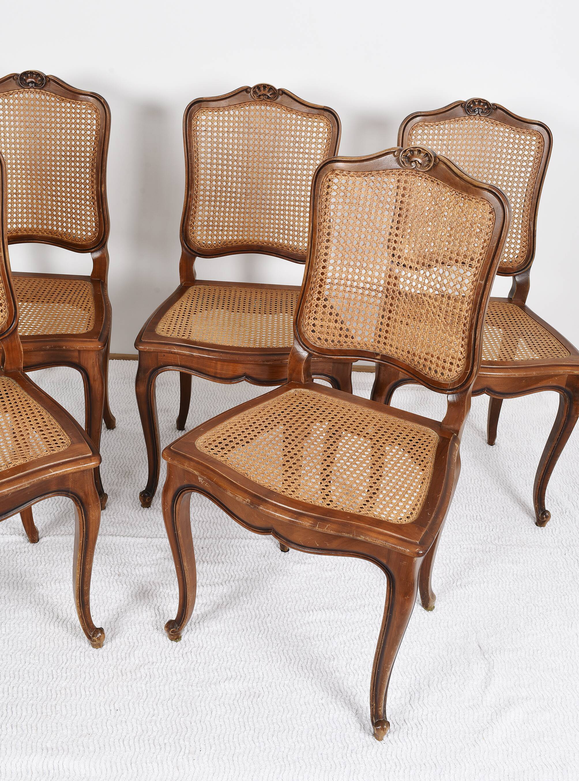 Series of 5 cane chairs, backs and seats, Louis XV style