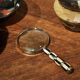 Art Deco magnifying glass in mother-of-pearl and silver, 1930.